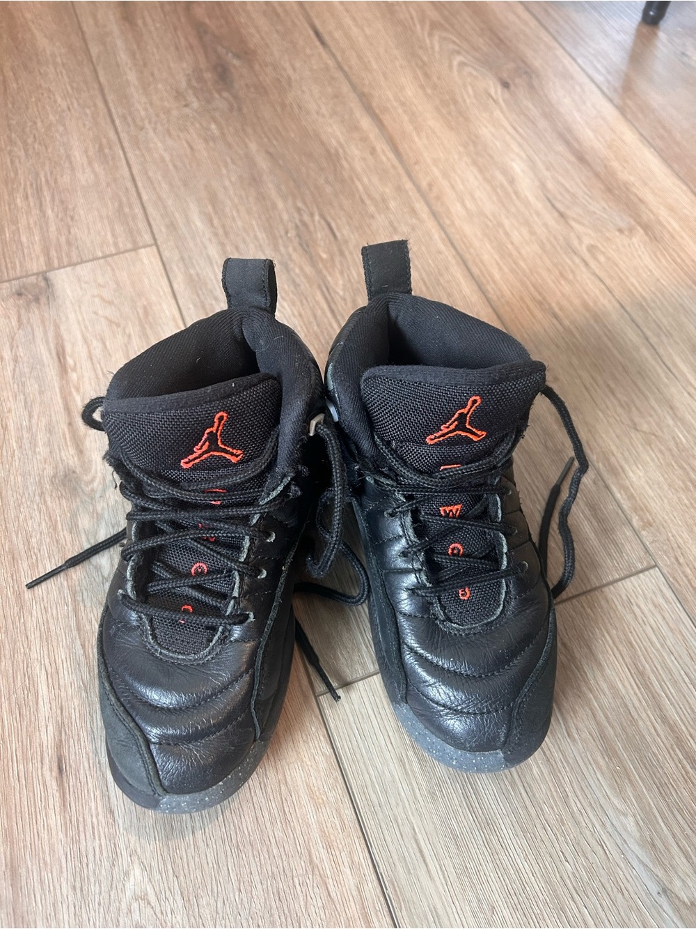 Jordan Kids Black Sneakers with Orange Jumpman Accents